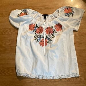 White with orange embroidered flowers shirt